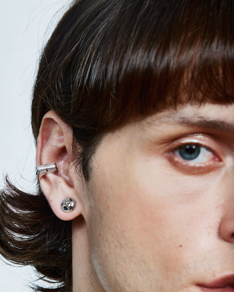Why Cross Earrings for Men Are More Than Just a Trend